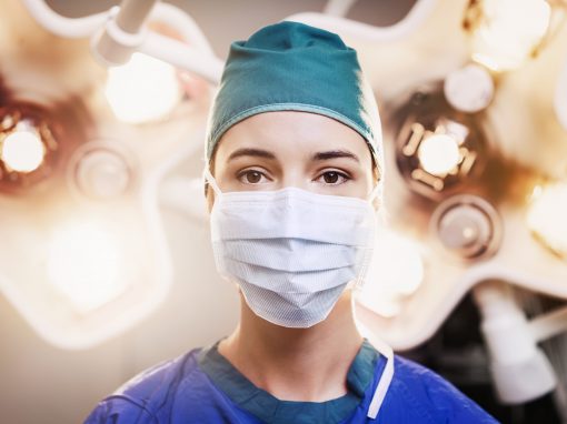 Portrait of surgeon wearing surgical mask and cap