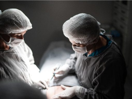 Doctors doing a surgery on operating room in hospital
